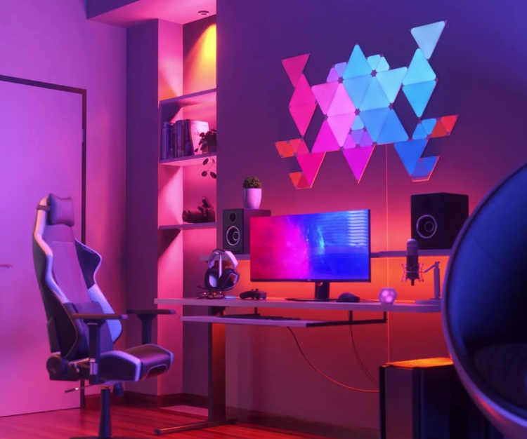 Office bedroom setup with Nanoleaf Lines RGB lights mounted above the desk and monitor. The perfect gaming lights for your PC battlestation.